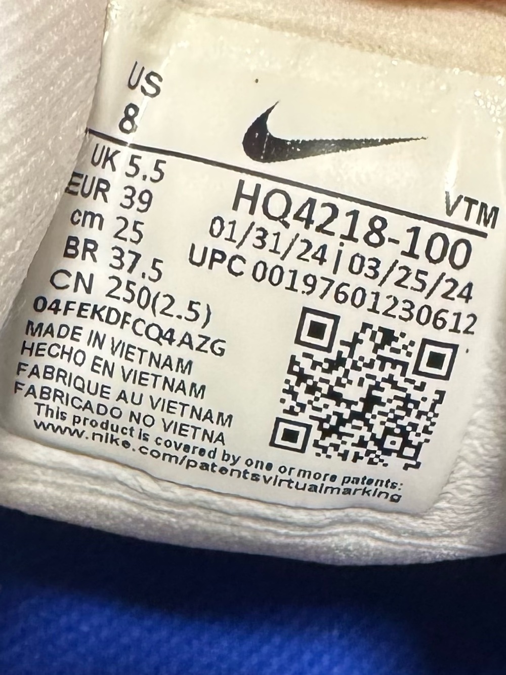Nike White Sneakers with Blue Swoosh and Orange Heel - Picture 6 of 6